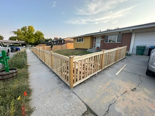 Accessible cedar walkway fence installed at a Utah property