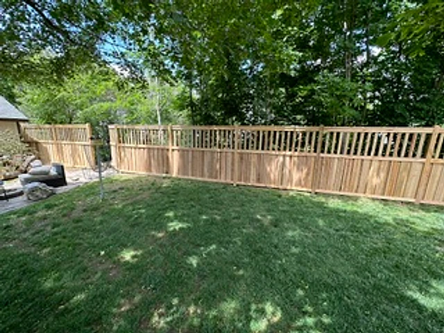 Backyard cedar baluster fence installed at a Utah property