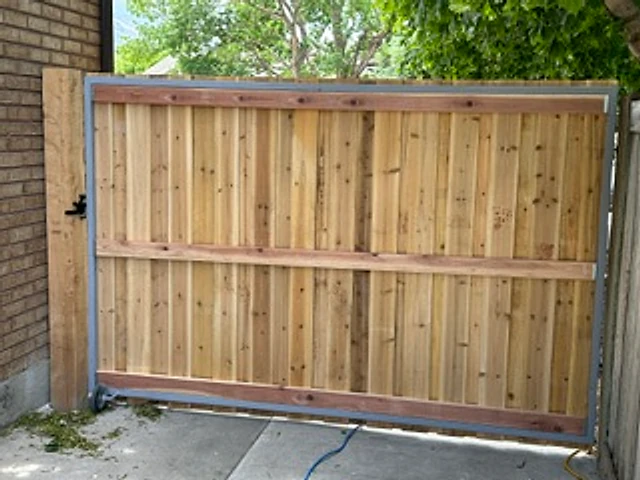 Cedar driveway gate close-up installed at a Utah property