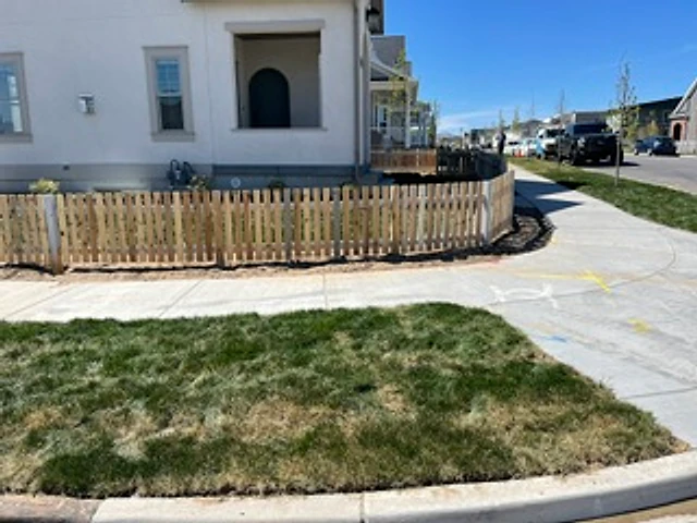 Cedar picket corner fence installed at a Utah property