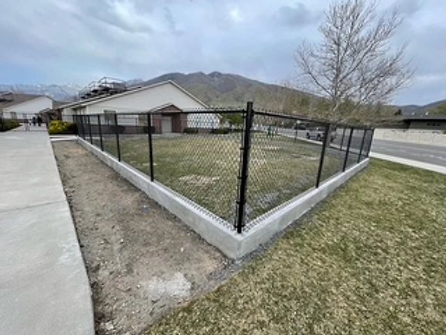 Concrete-curb iron perimeter installed at a Utah property