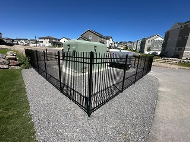 Corner-lot iron enclosure installed at a Utah property