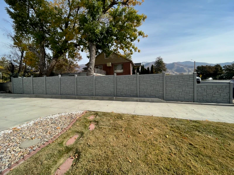 Long gray SimTek privacy wall installed at a Utah property