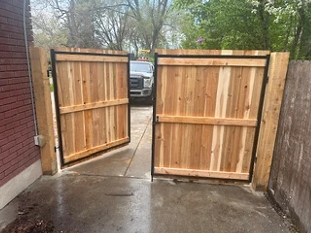Matching cedar gate pair installed at a Utah property