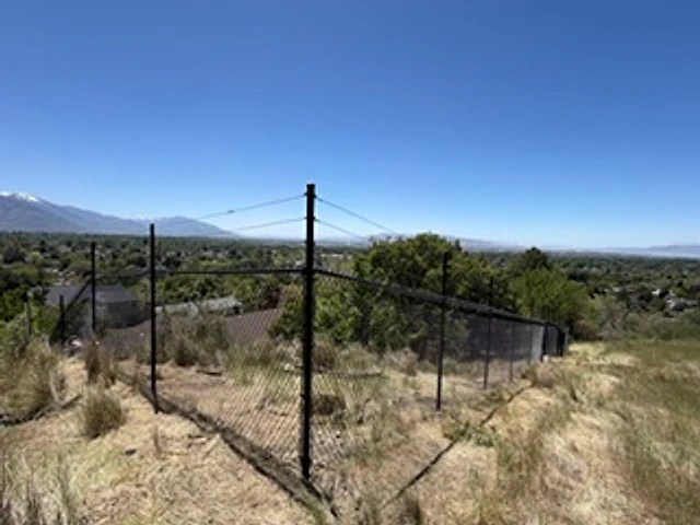 Mountain acreage chain link installed at a Utah property