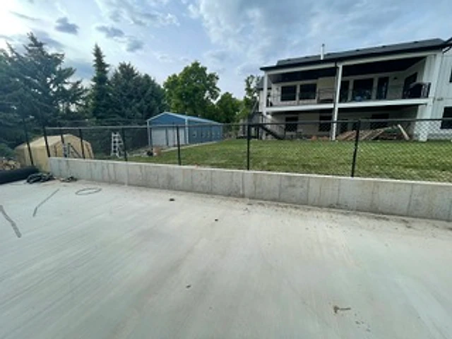 Raised-court chain-link boundary installed at a Utah property