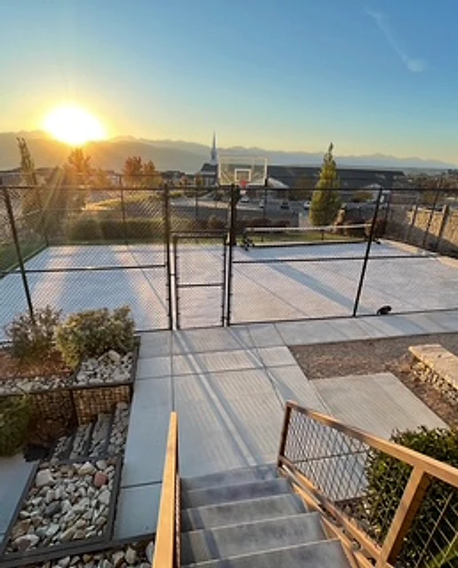 Sunset sport-court enclosure installed at a Utah property