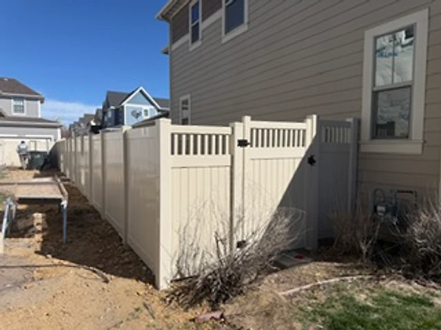 Tan vinyl side-yard privacy installed at a Utah property