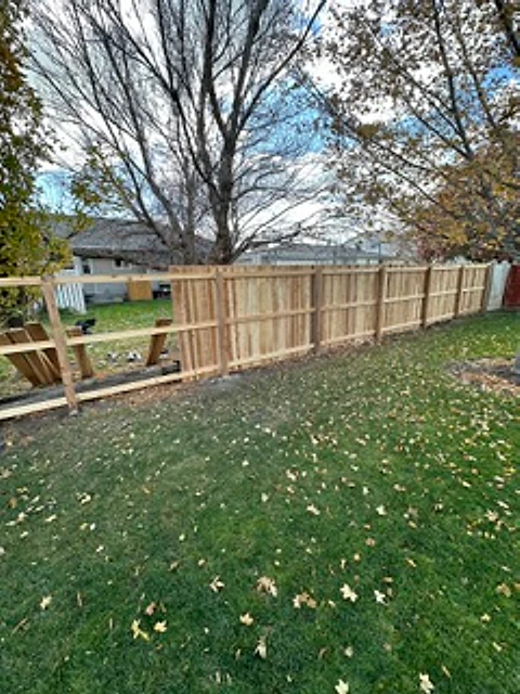 Tree-lined cedar perimeter installed at a Utah property