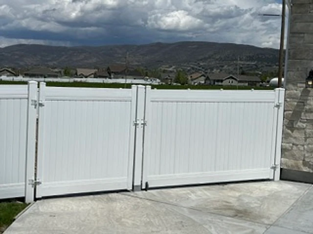 White vinyl access pair installed at a Utah property